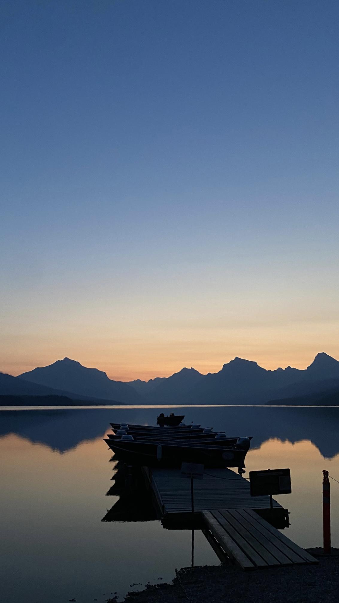 A quiet dock at dusk on Lake McDonald